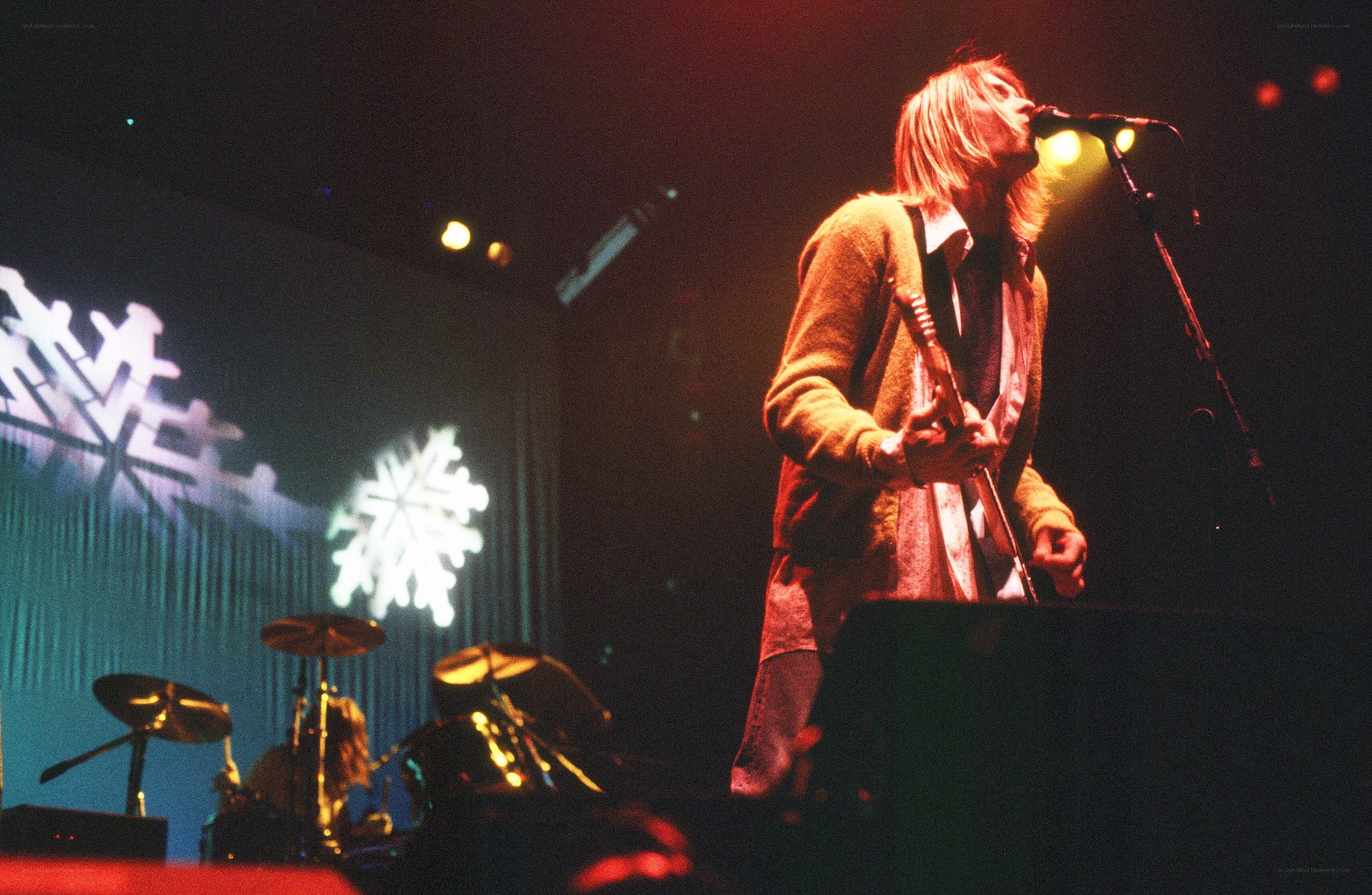 Kurt Cobain performing on stage
