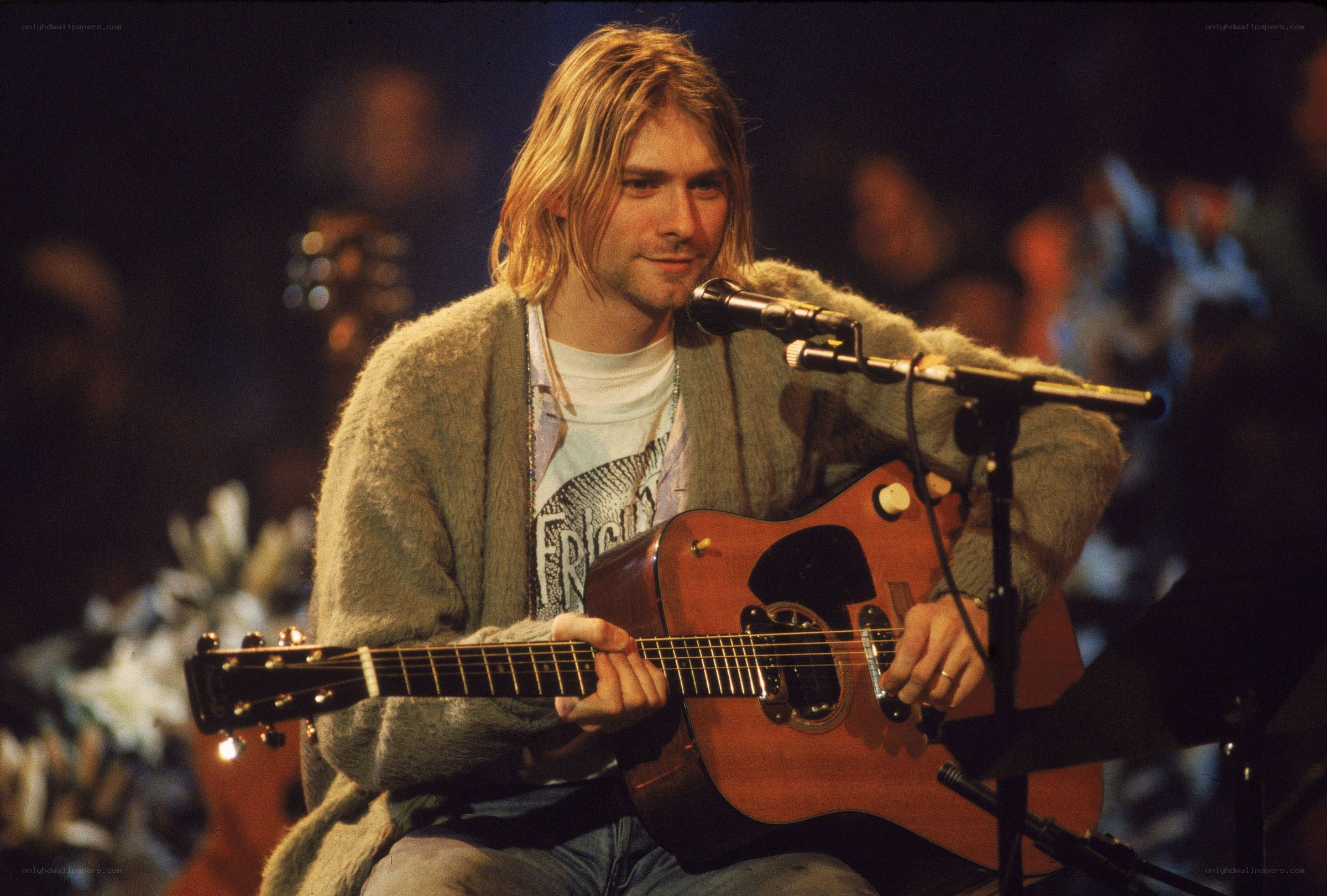 Kurt Cobain performing on stage