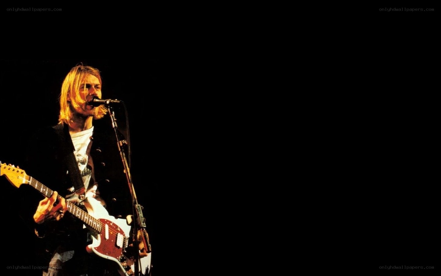 Kurt Cobain performing on stage