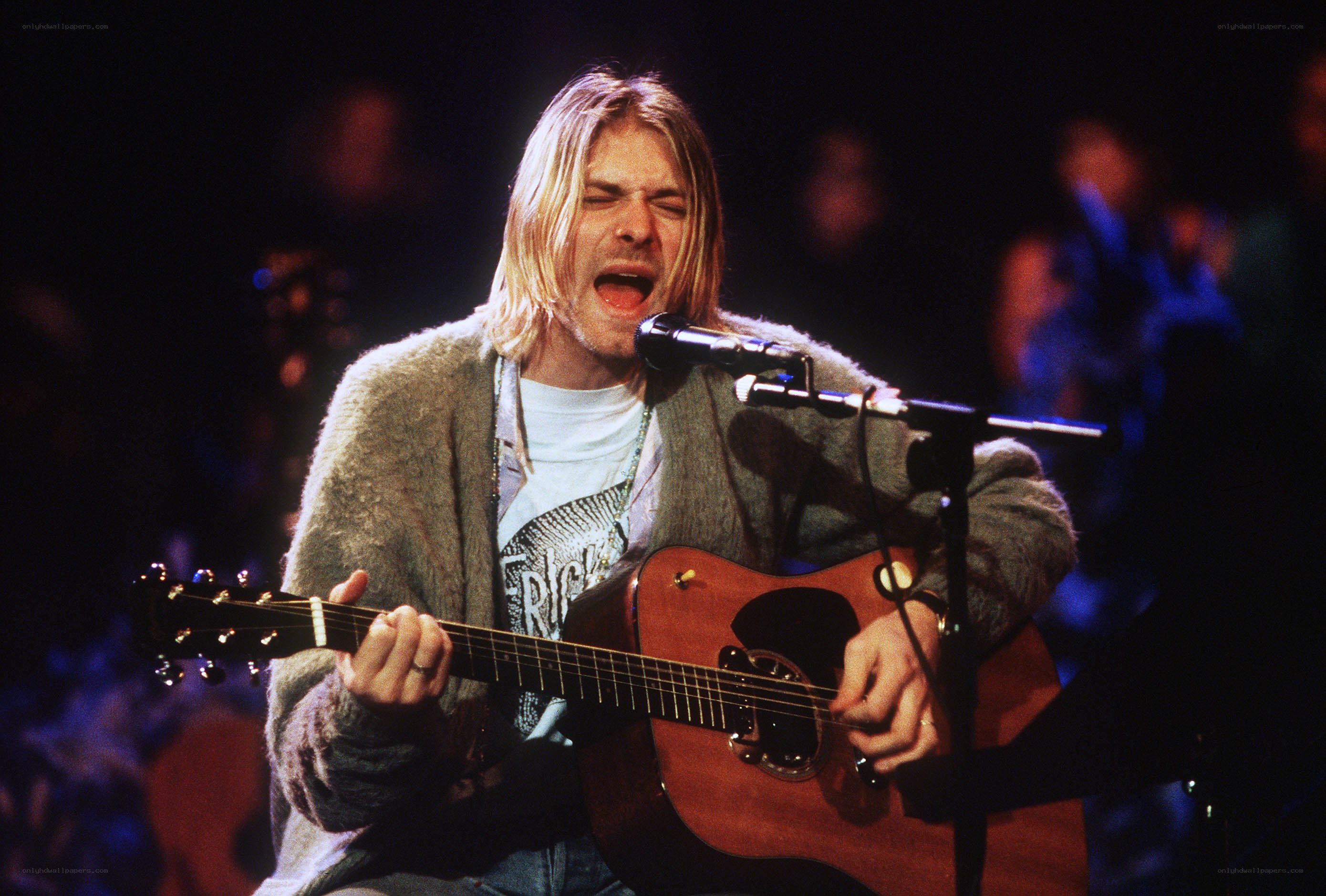 Kurt Cobain performing on stage