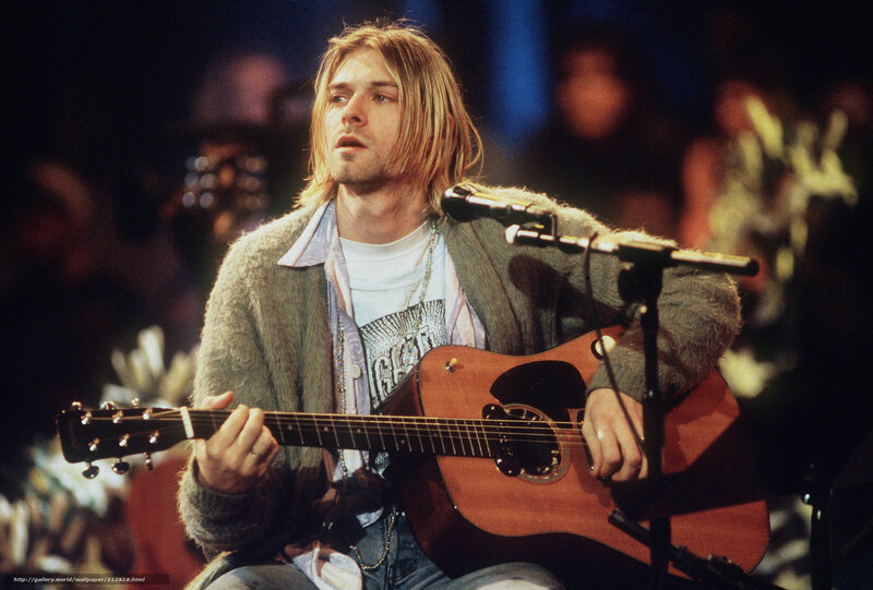 Kurt Cobain performing on stage