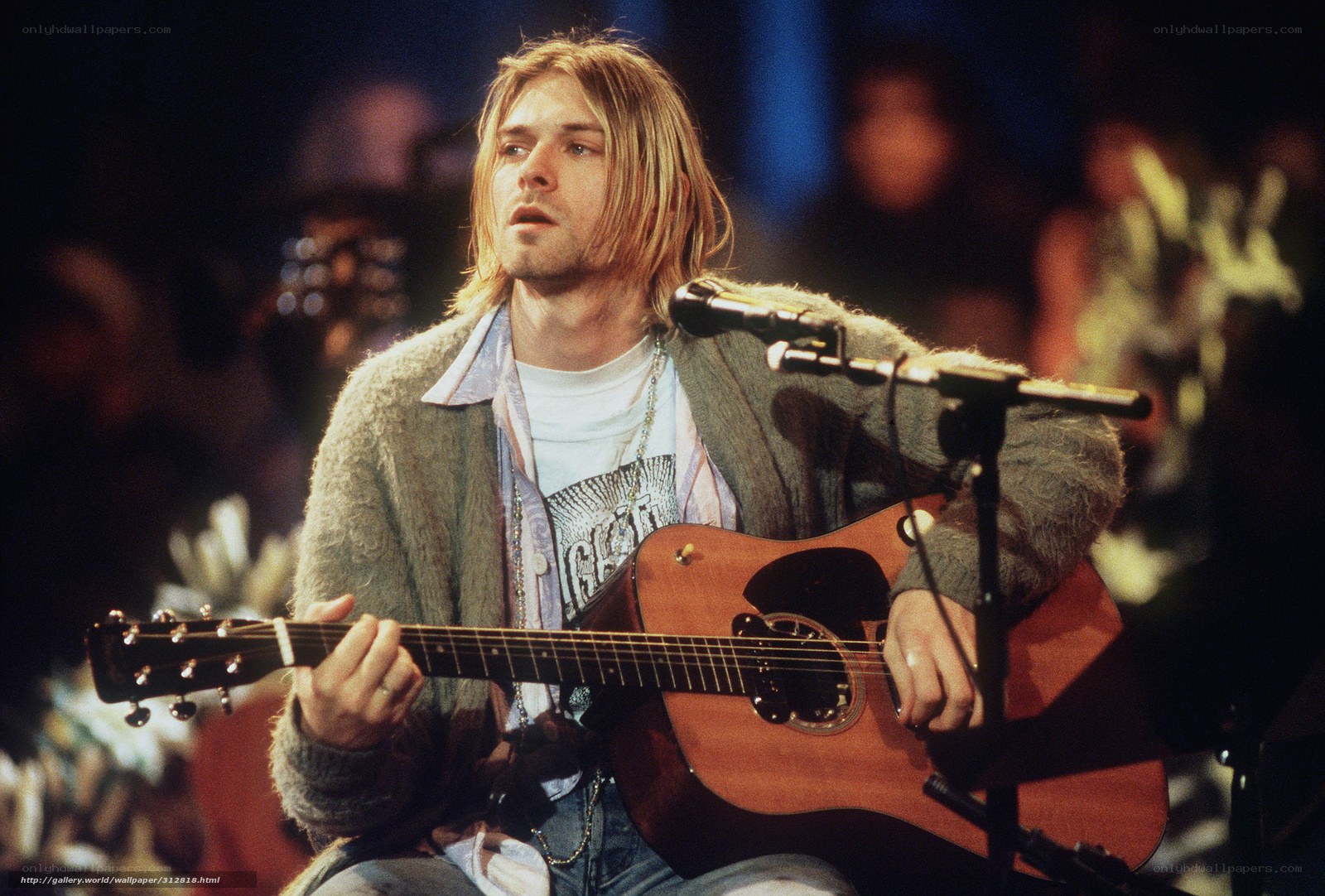Kurt Cobain performing on stage
