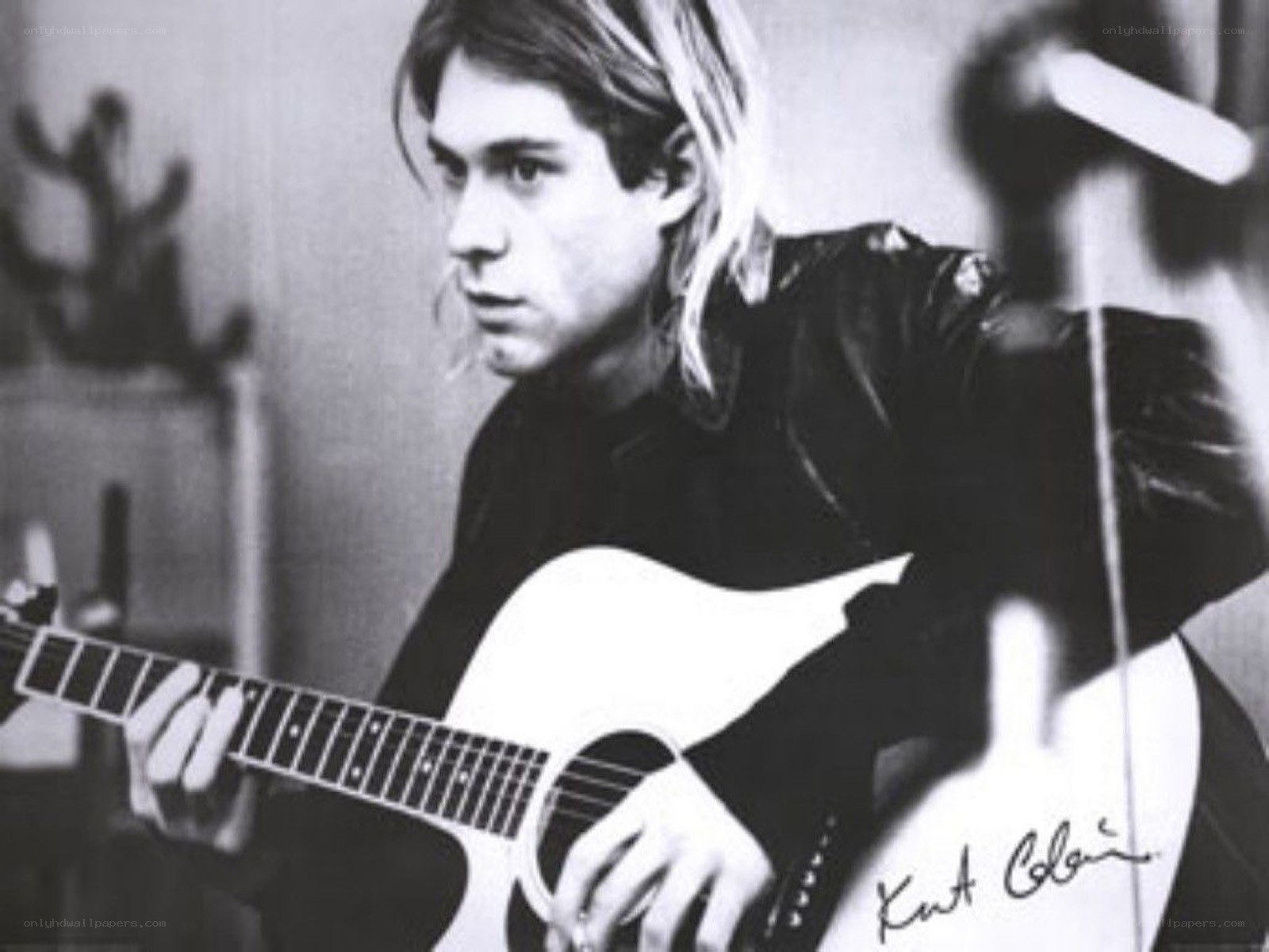 Kurt Cobain playing guitar