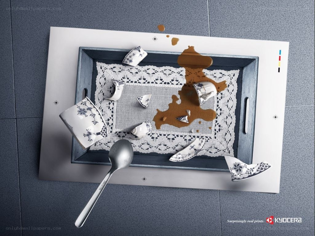 Kyocera print ad with broken tea set