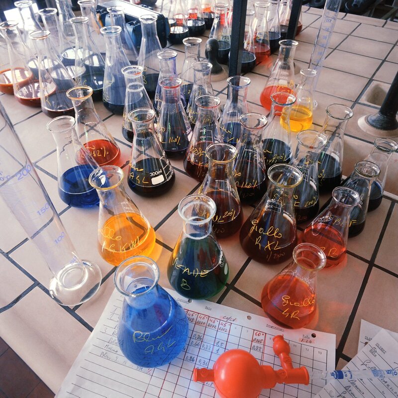 Lab flasks with colored liquids