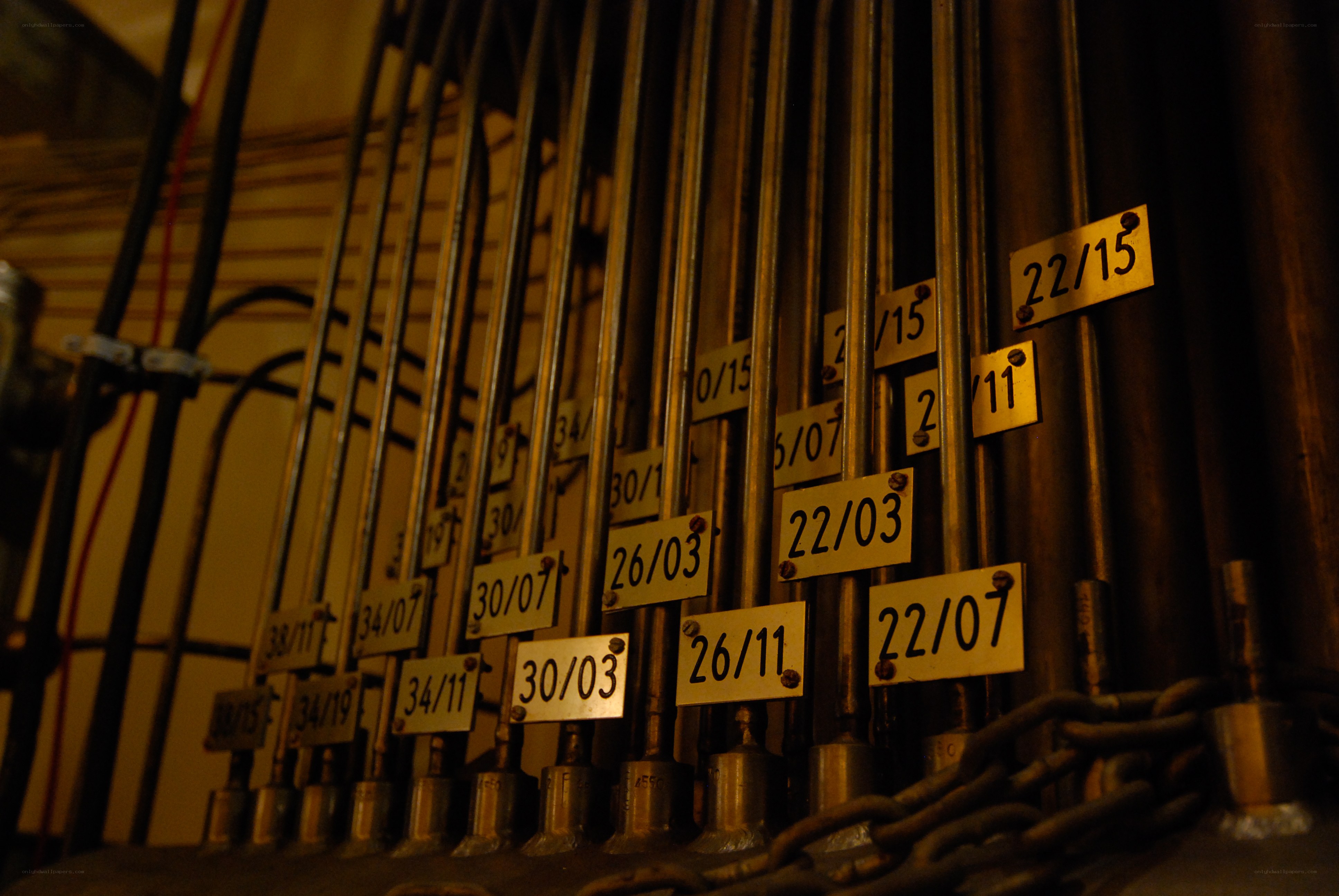 labeled metal pipes in a room