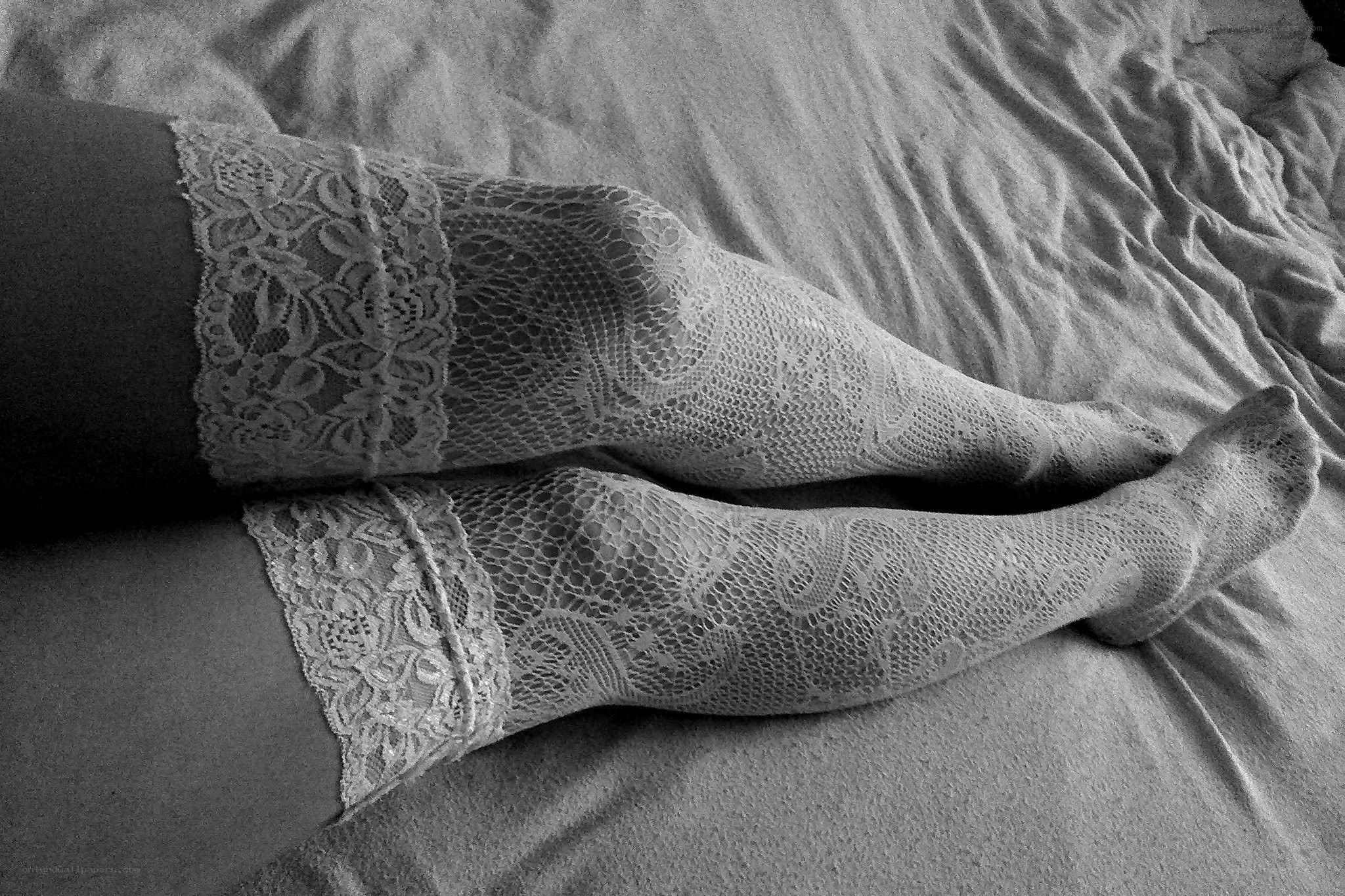 Lace stockings on bed
