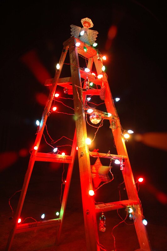 ladder decorated as a christmas tree