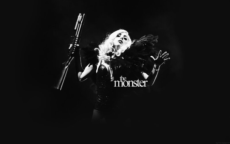 Lady Gaga holding a gun