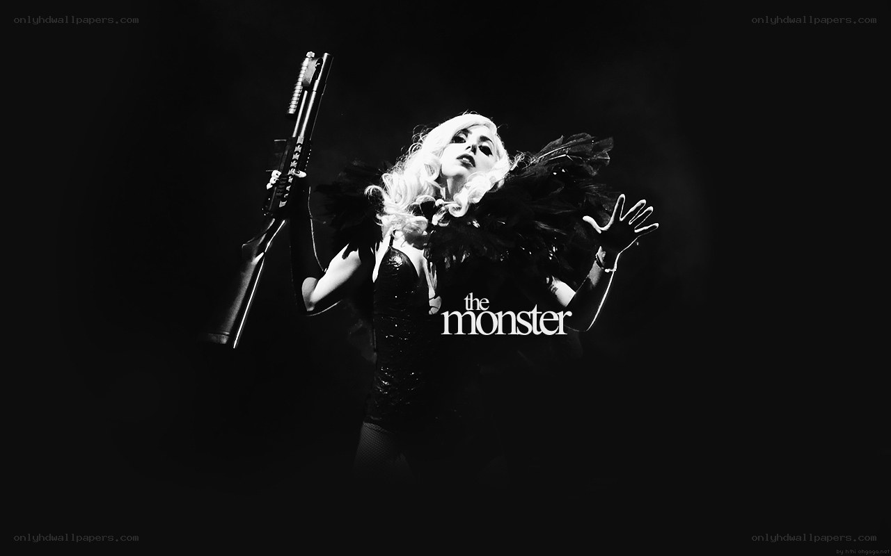 Lady Gaga holding a gun