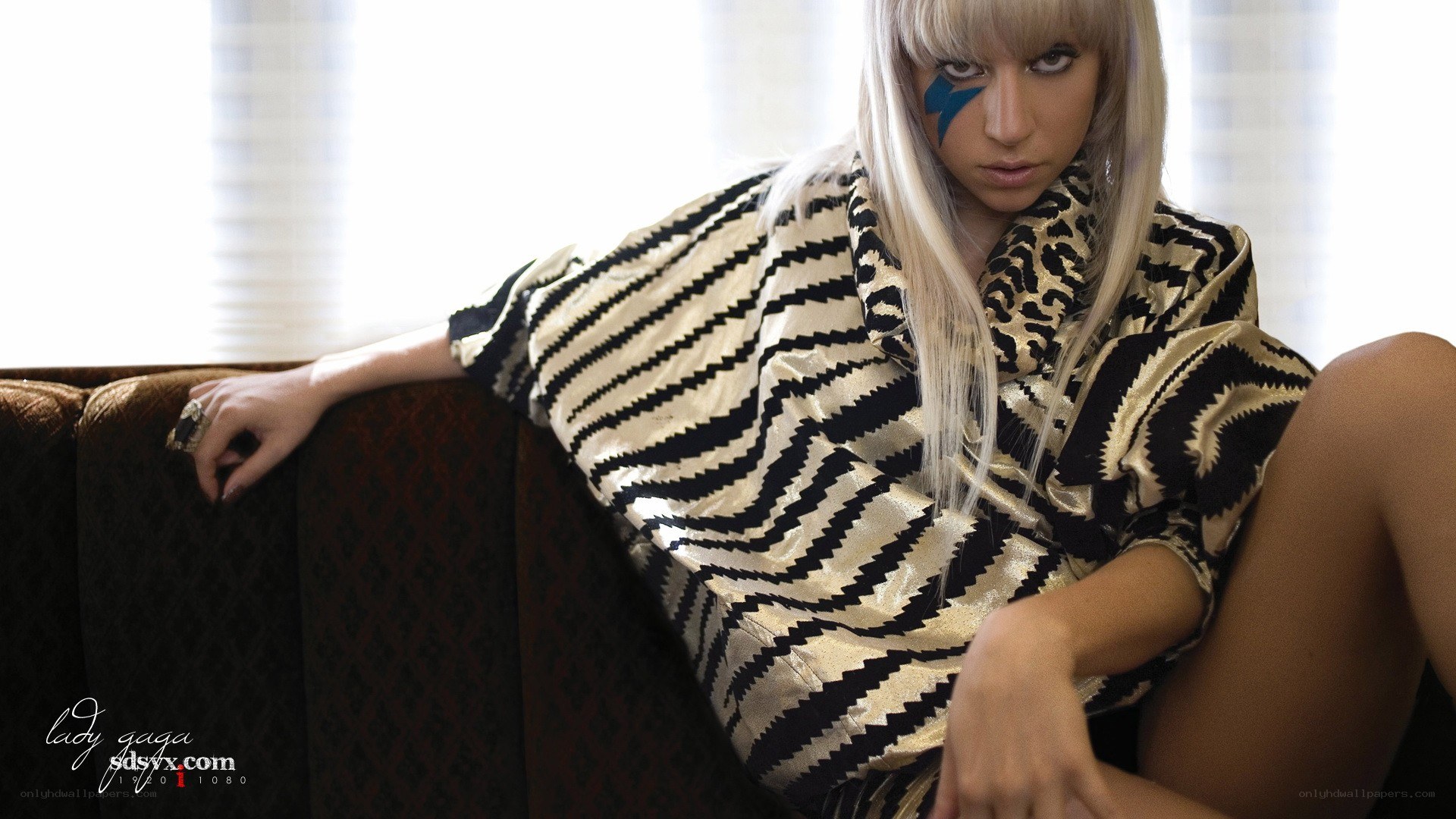 Lady Gaga on a couch