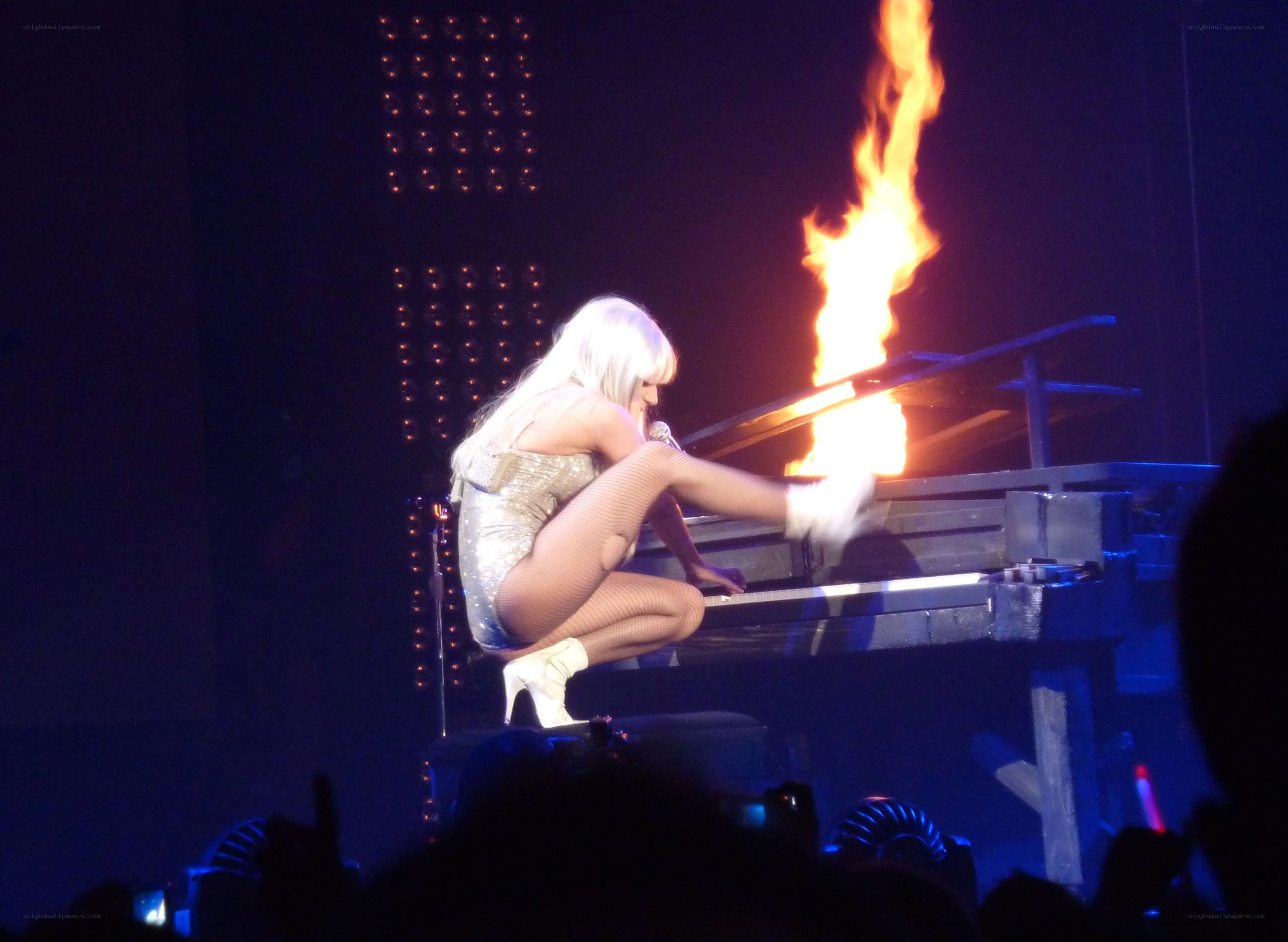 Lady Gaga on stage with fire