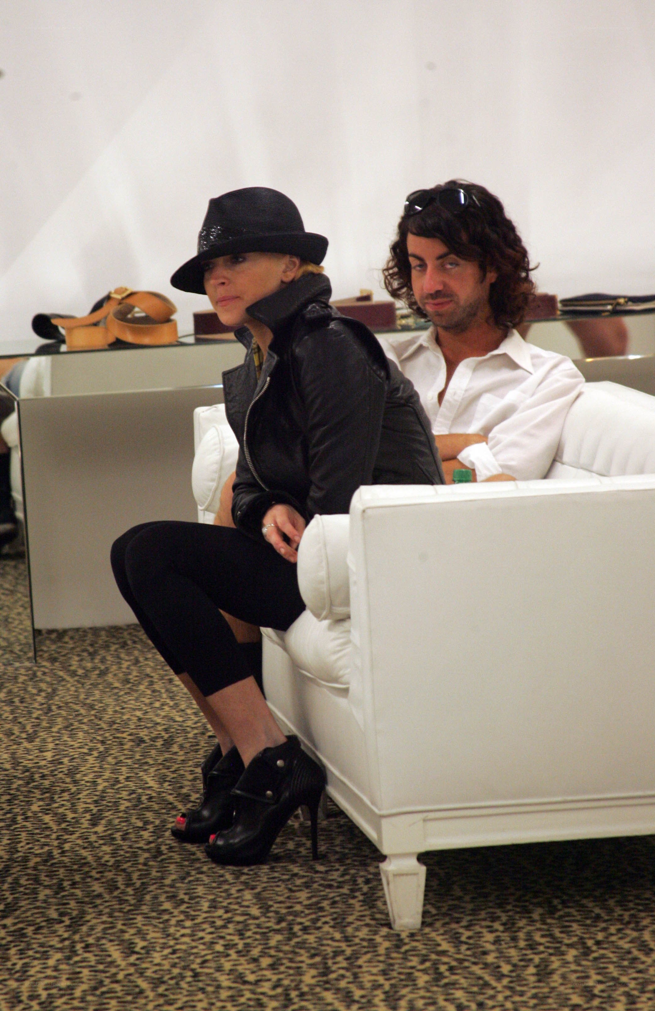 Lady Gaga sitting with a man