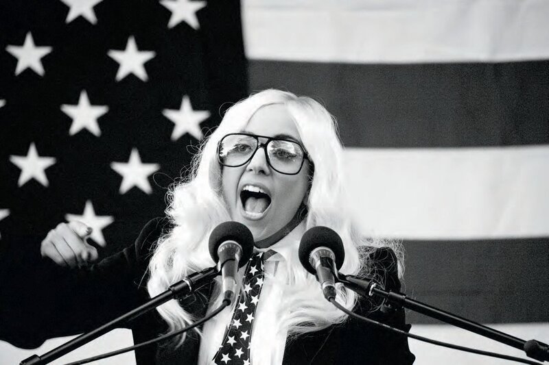 Lady Gaga speaking at podium