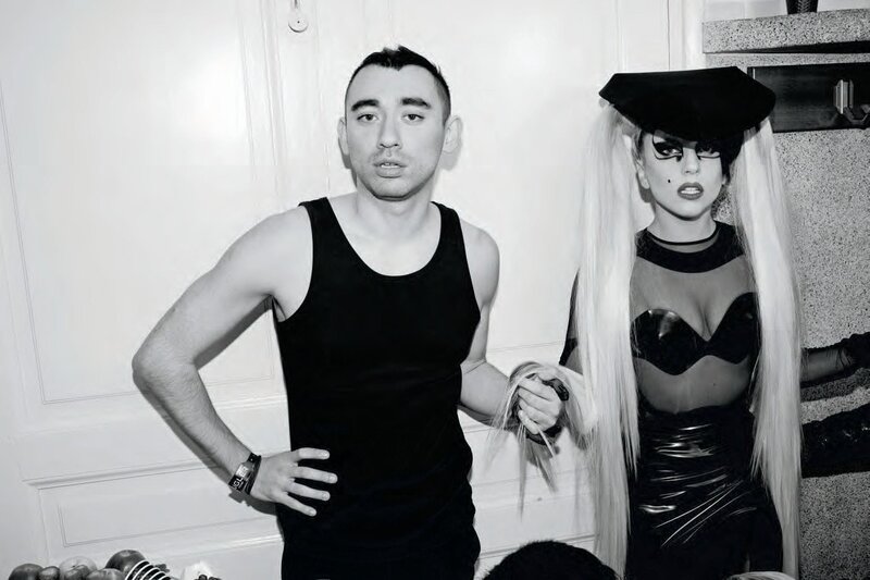 Lady Gaga with a man in black
