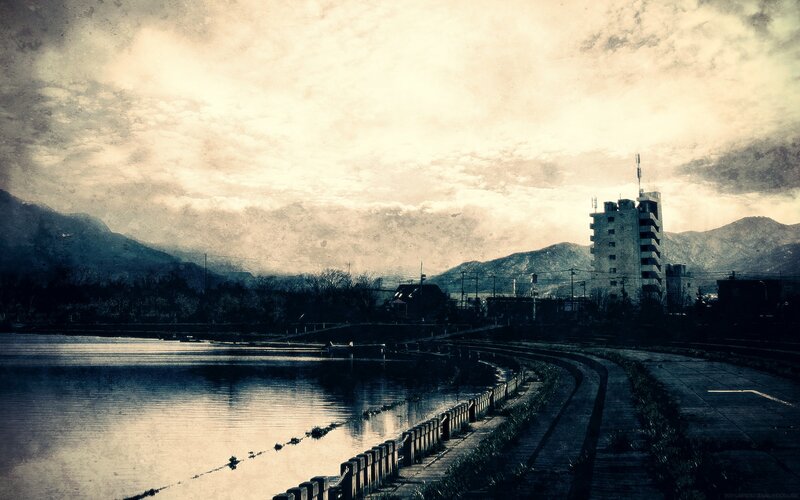 Lake and Building at Dusk
