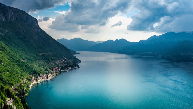 Lake and Mountains Landscape — Blue, Serene, Afternoon, Photograph, Village