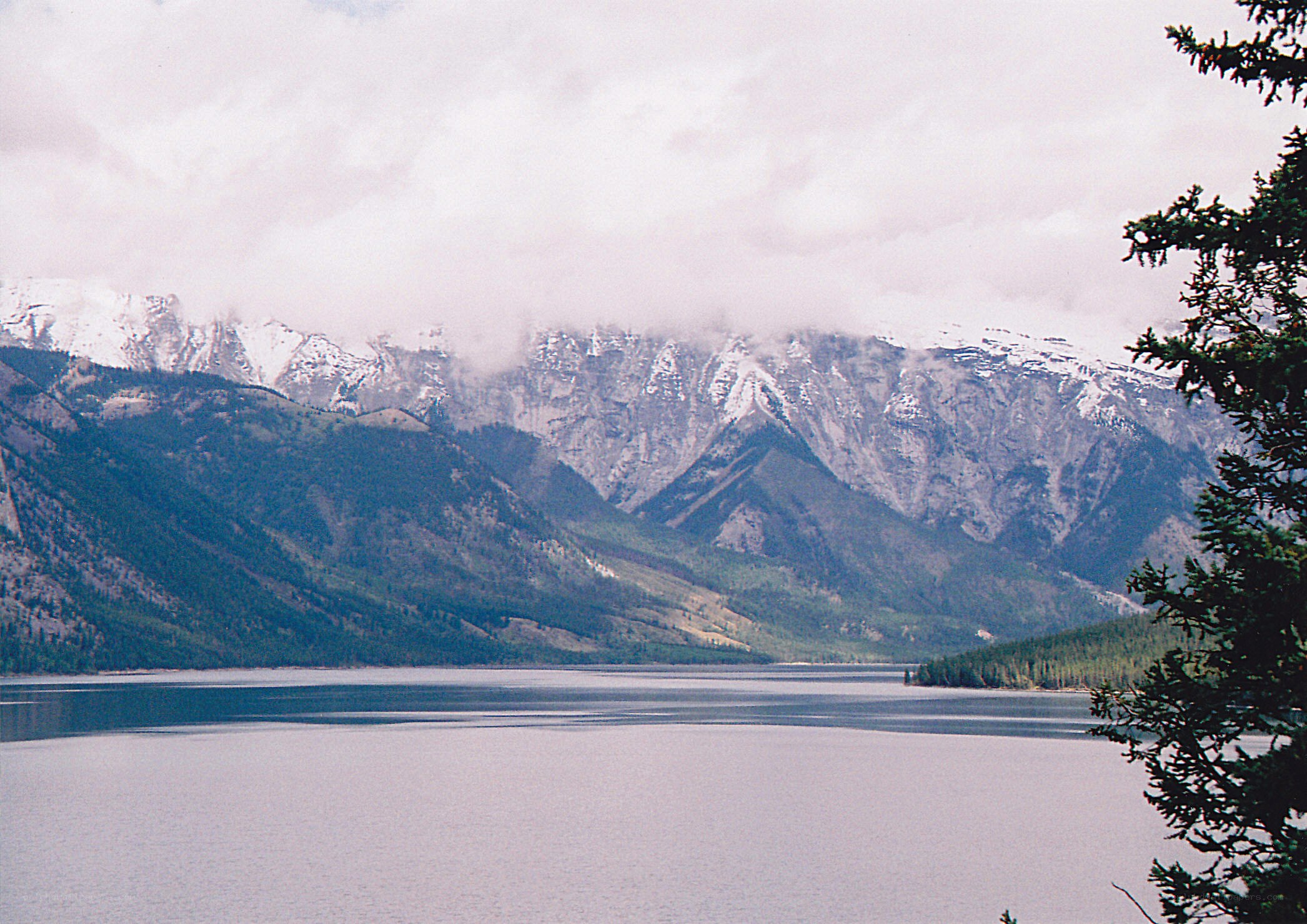 Lake and snow-capped mountains
