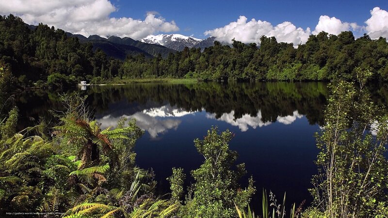 Lake and snow-capped mountains
