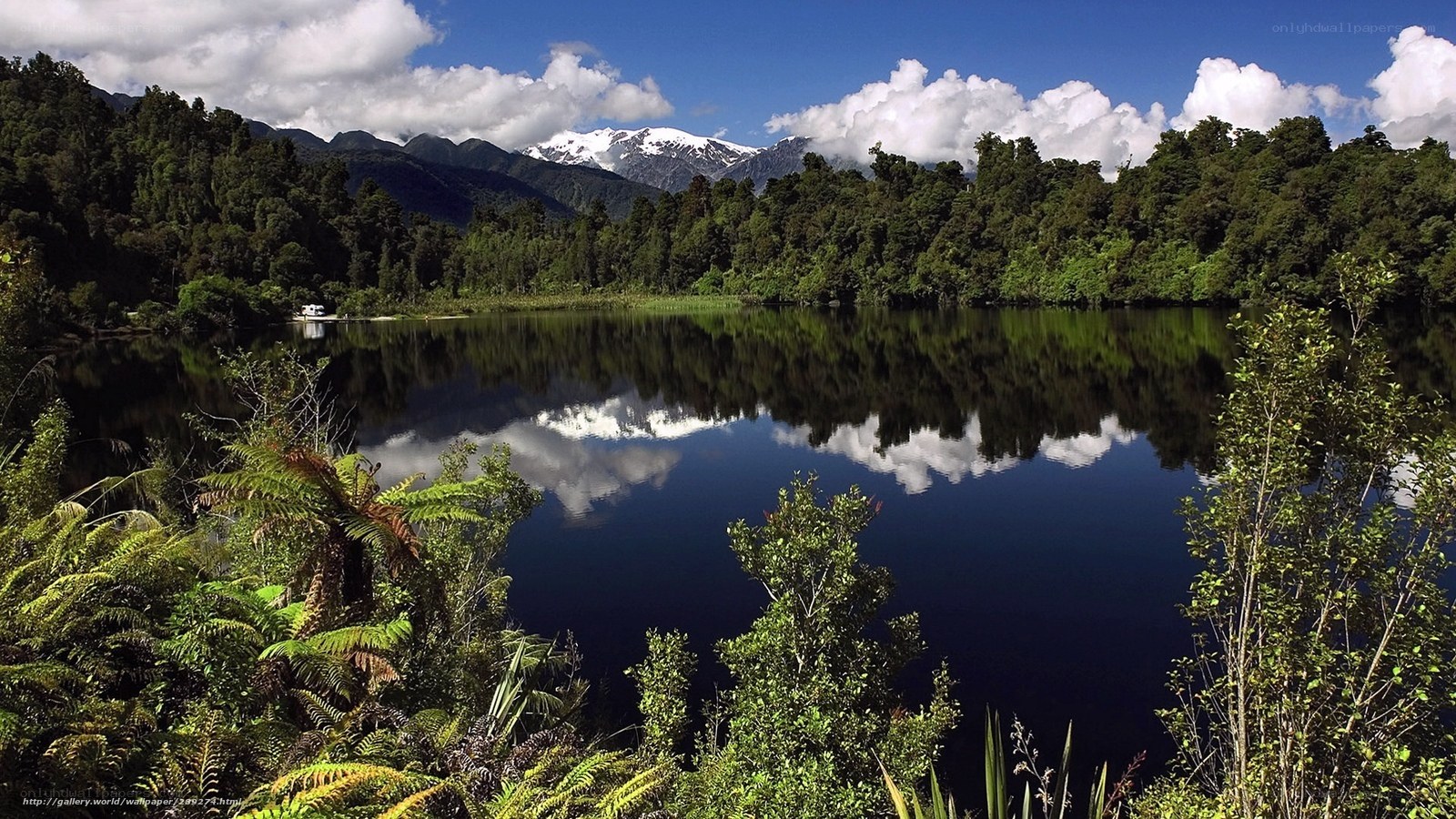 Lake and snow-capped mountains