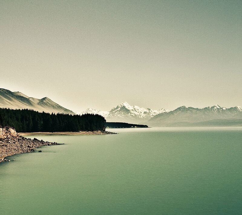Lake and snow-capped mountains