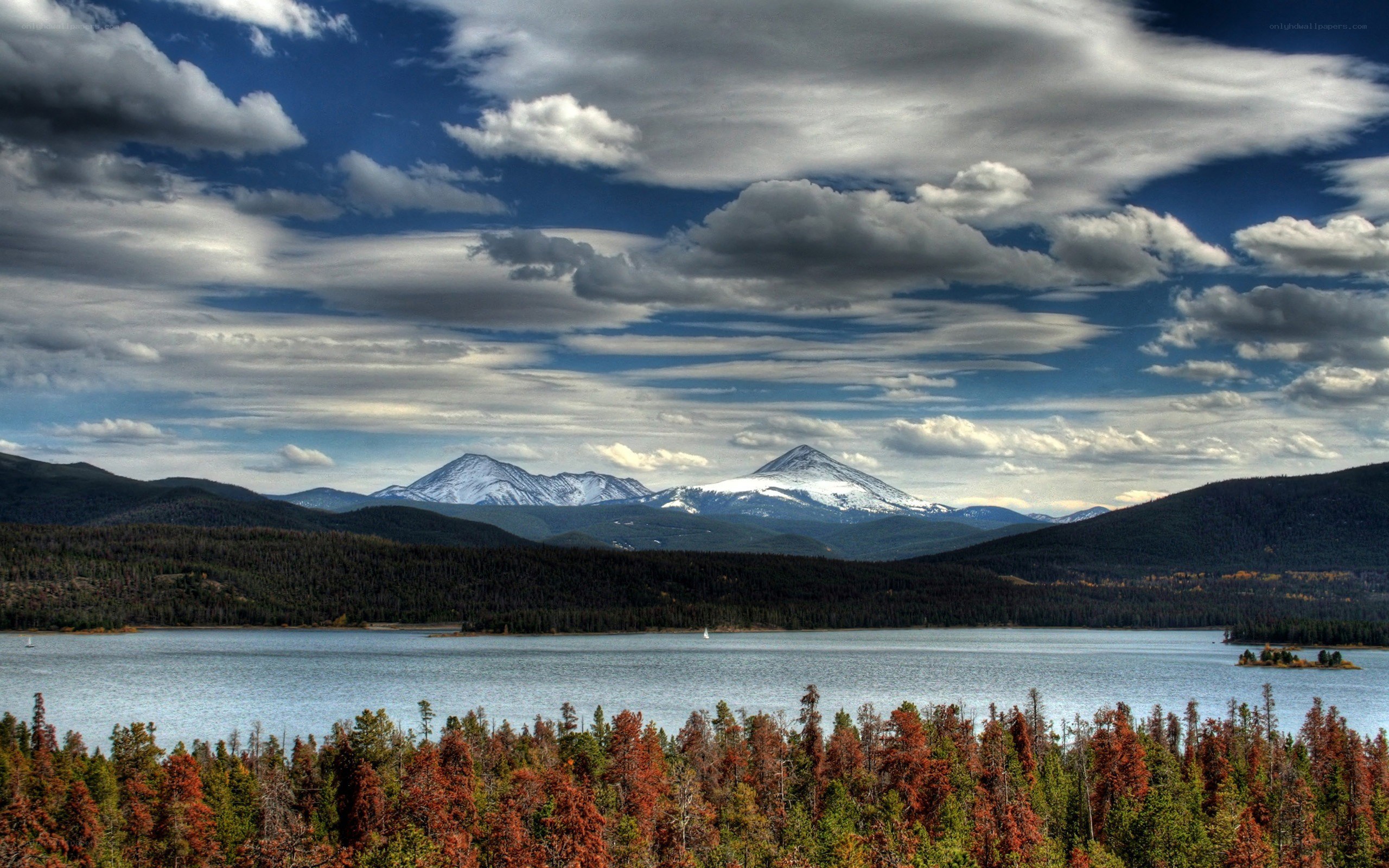 Lake and snow-capped mountains