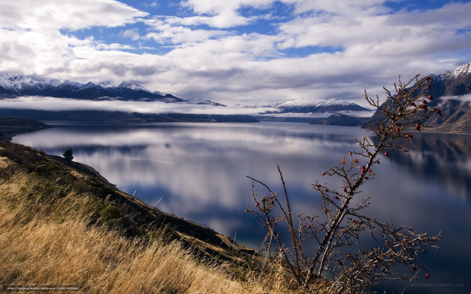 Lake and snow-capped mountains