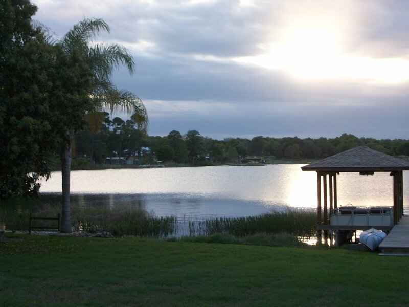 Lake at dusk with gazebo