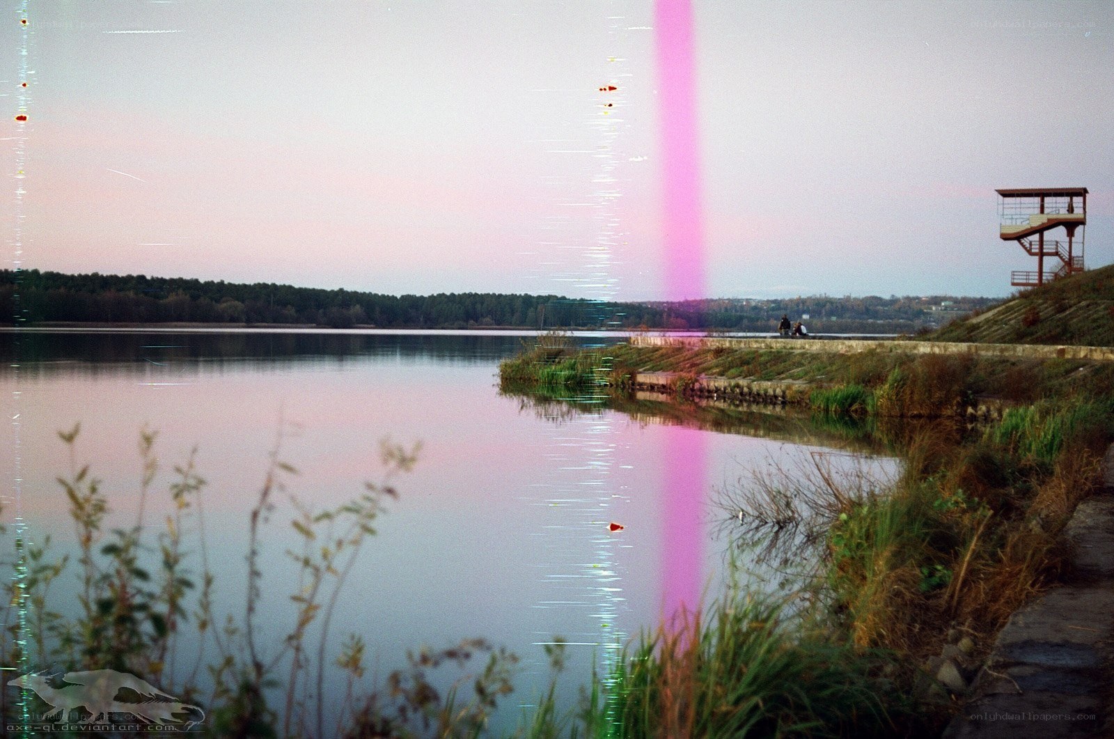Lake at dusk with pink light