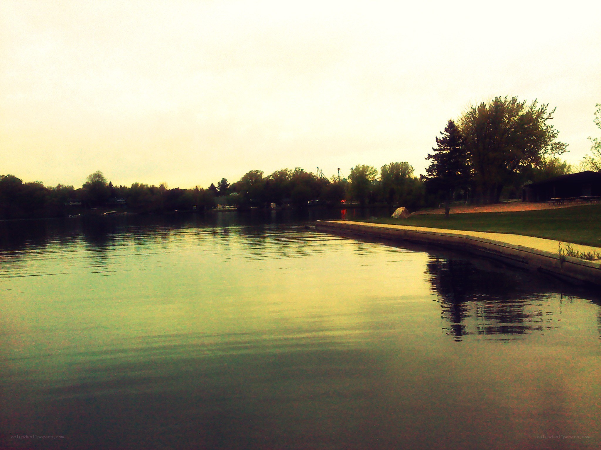 Lake at dusk with trees