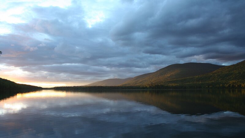 Lake at Sunset — Blue, Serene, Photograph, Mountains, Forest, Clouds, Gray, Orange