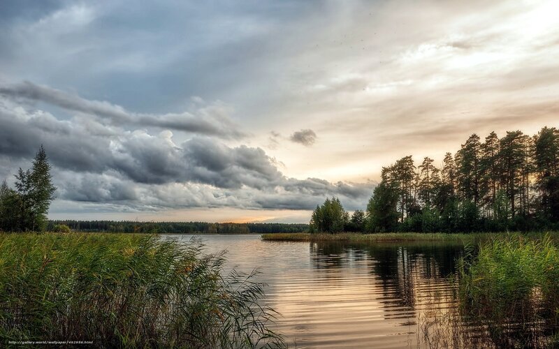 Lake at sunset with clouds