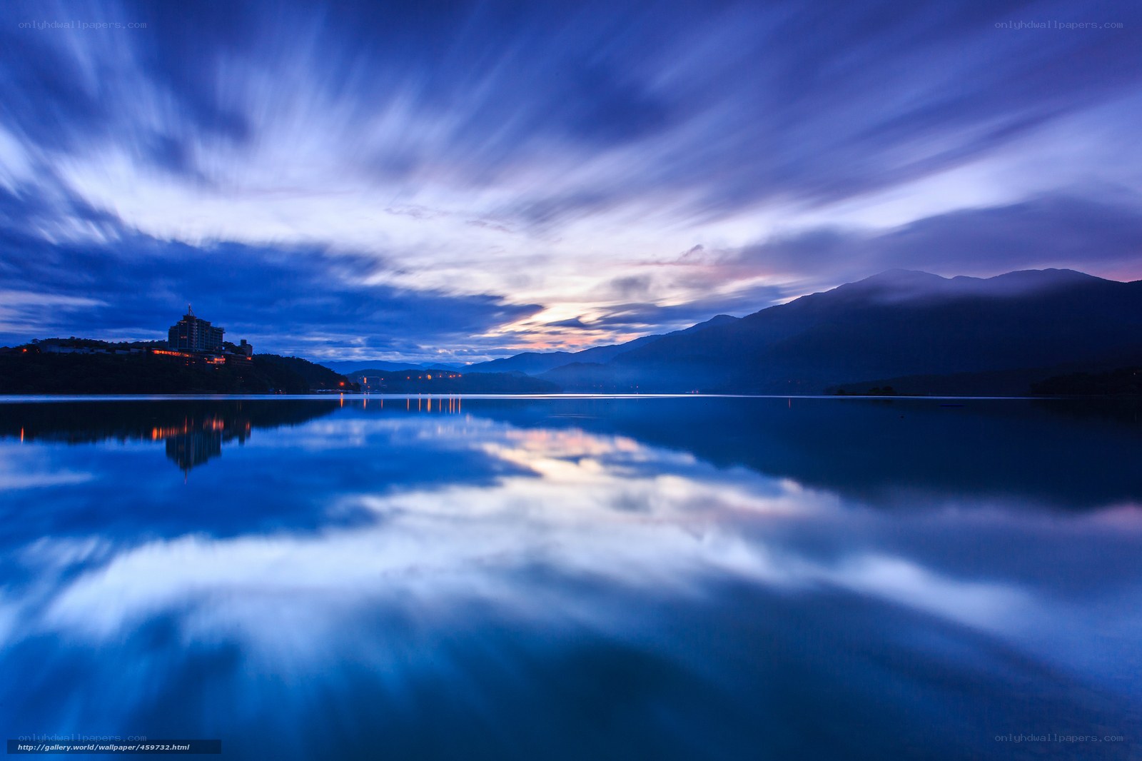 Lake at twilight with mountain view