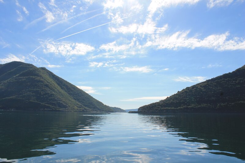 Lake between green hills