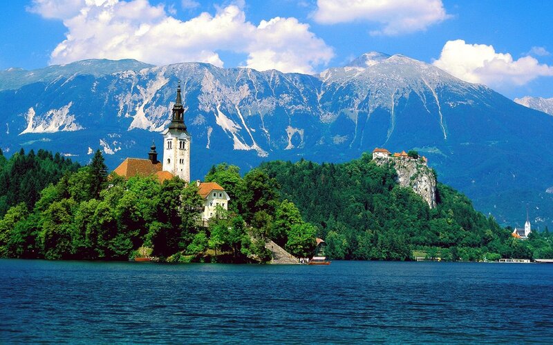 Lake Bled with church and mountains
