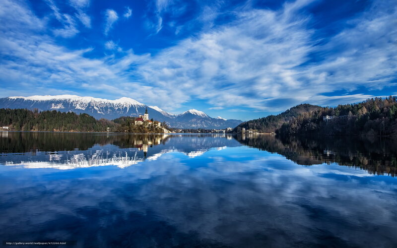 Lake Bled with snow-capped mountains