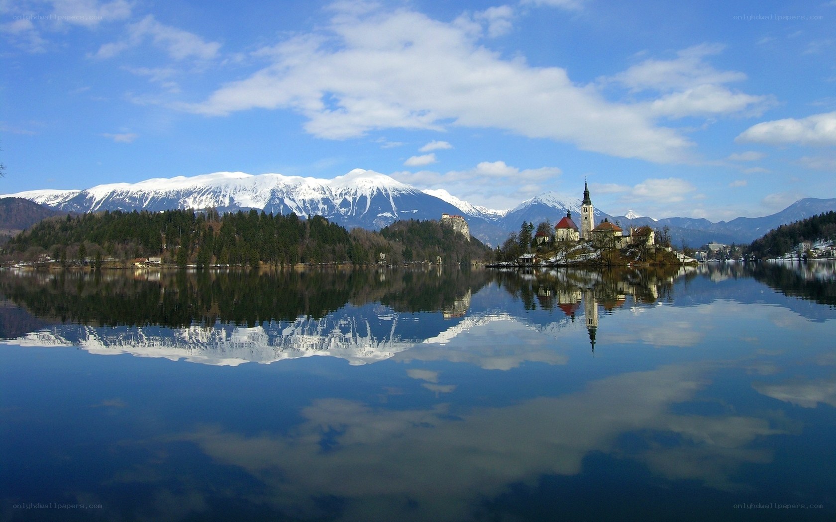 Lake Bled with snow-capped mountains