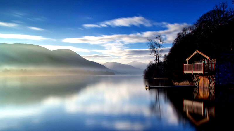 Lake House on a Misty Morning