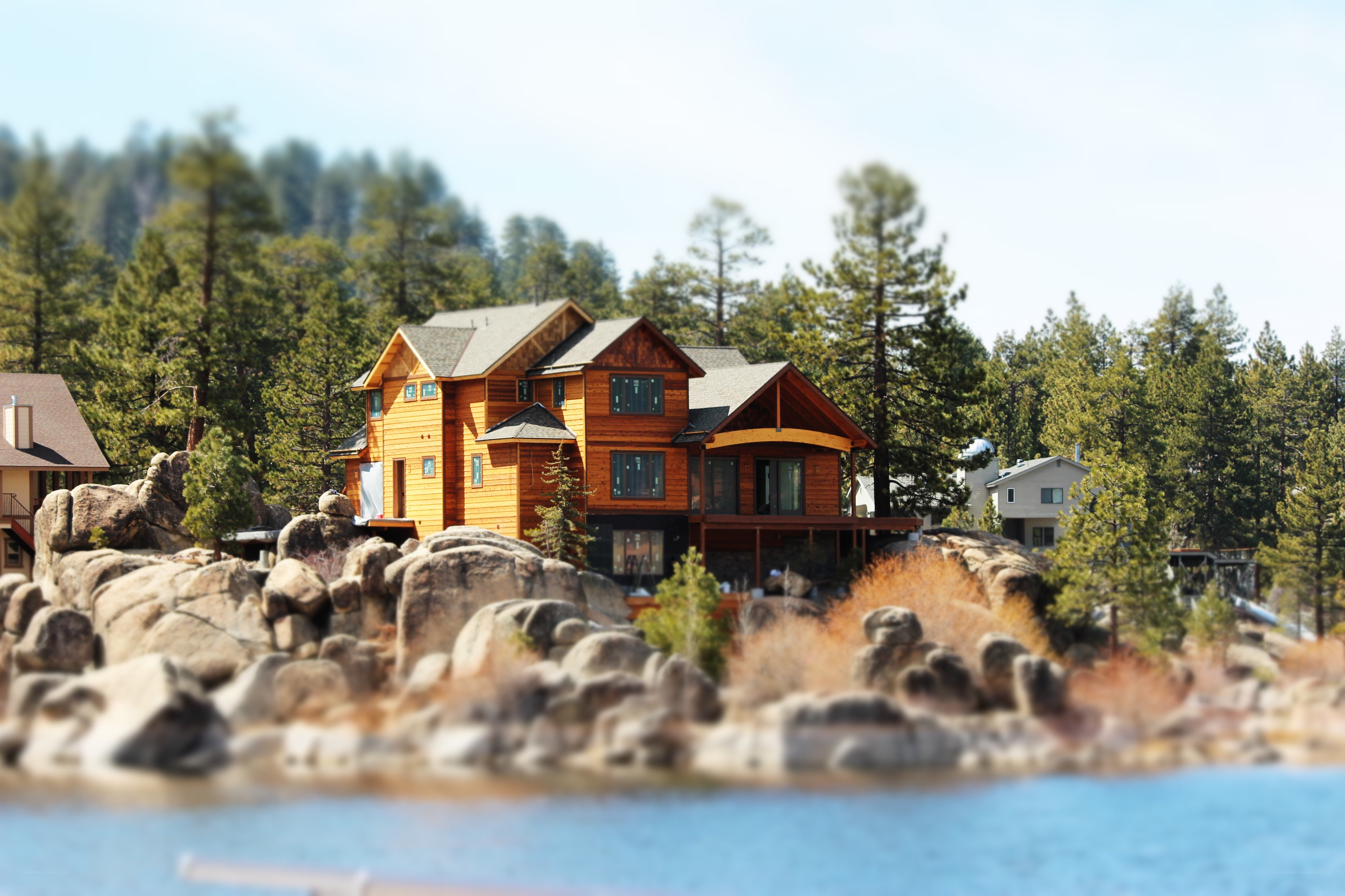 Lake house with forest view
