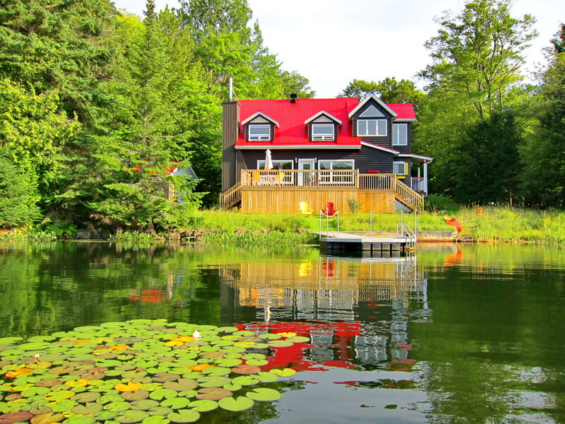 Lake House with Red Roof