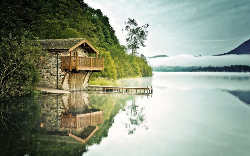 Lake house with wooden deck