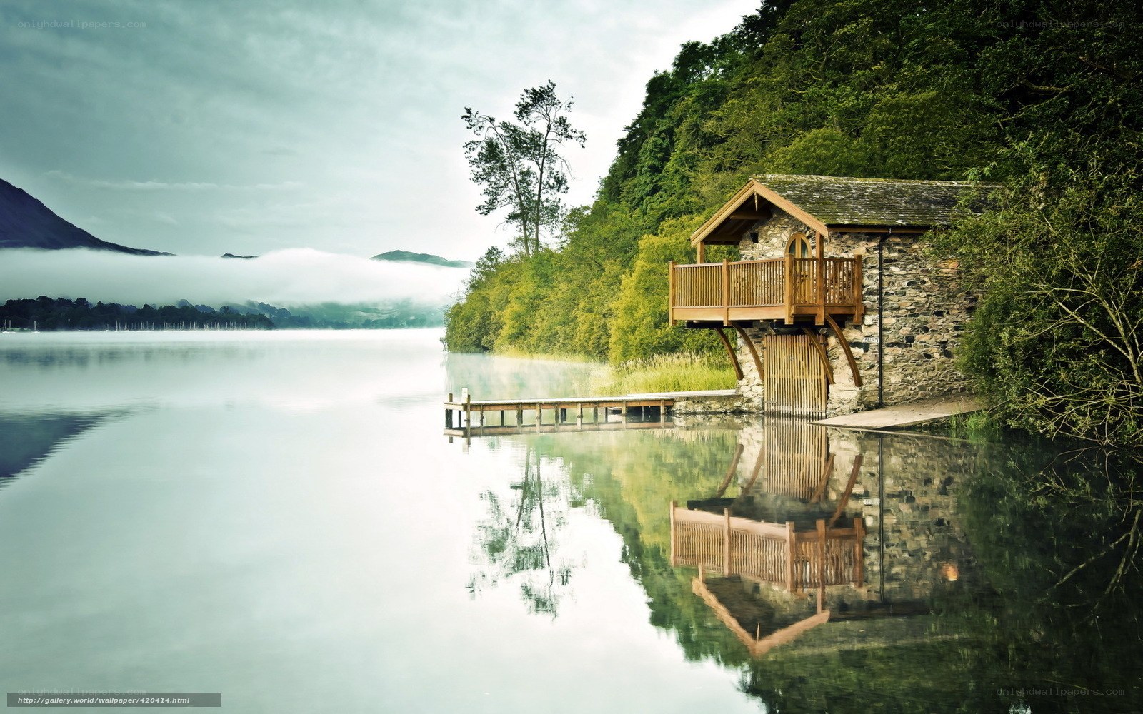 Lake house with wooden deck