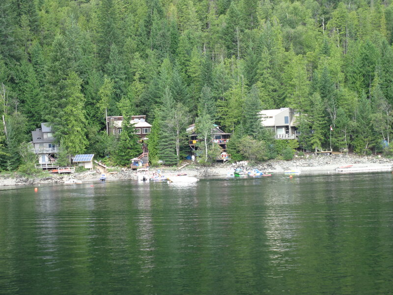 Lake Houses in Forest — Green, Serene