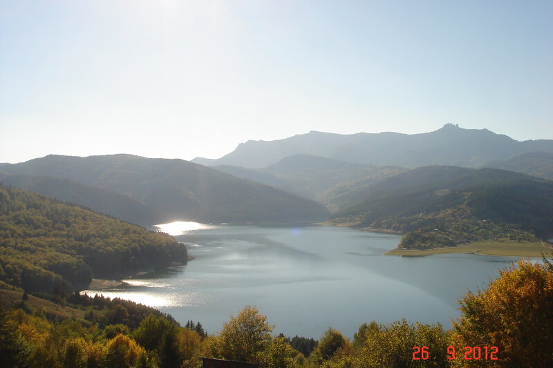 Lake in Mountain Valley — Blue, Serene, Afternoon, Photograph, Mountains, Forest, Sunlight