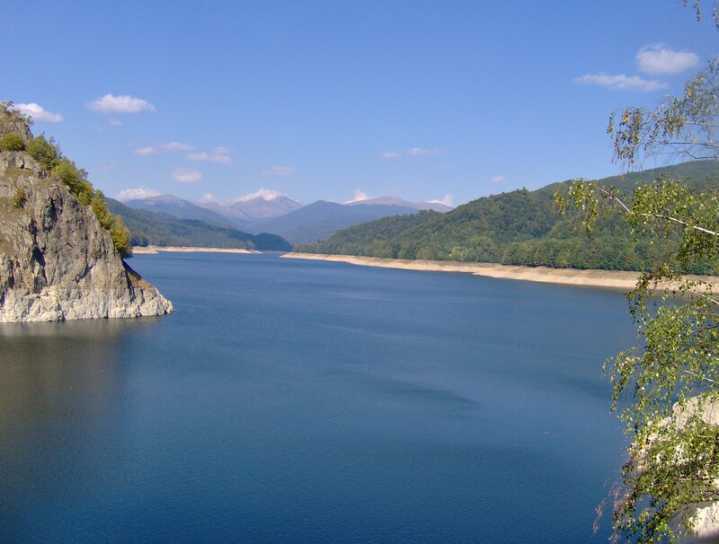 Lake in Mountain Valley — Blue, Serene, Afternoon, Photograph, Mountains, Trees, Rocky Cliff