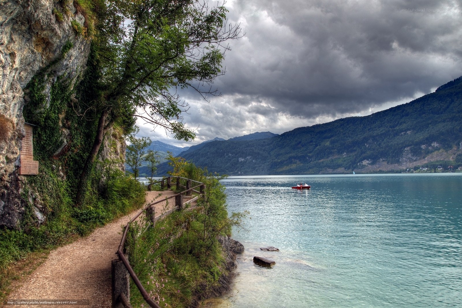 Lake path with red boat