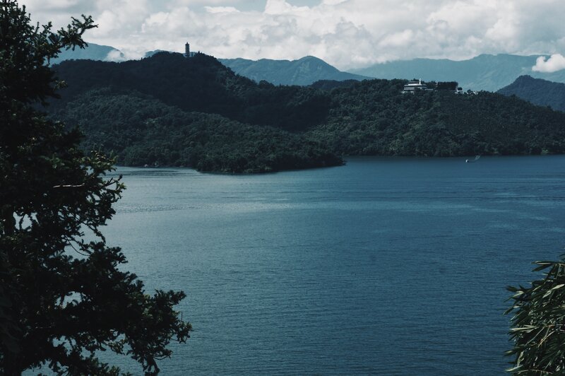 Lake Surrounded by Hills — Blue, Serene, Afternoon, Photograph, Trees, Mountains