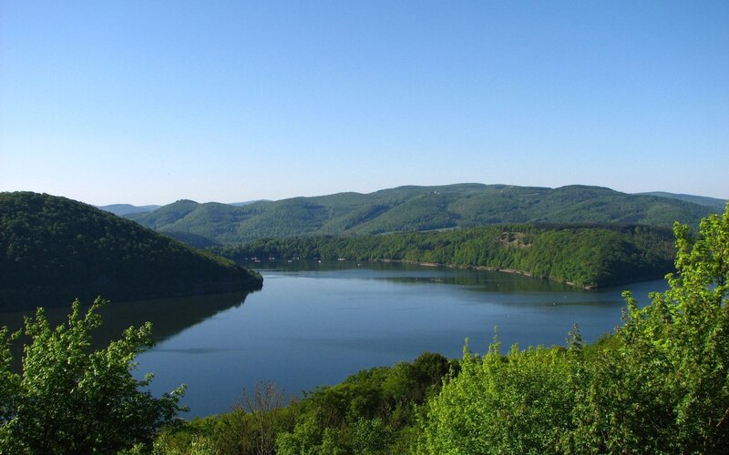 Lake Surrounded by Hills — Blue, Serene, Afternoon, Photograph, Trees, Sky, Green