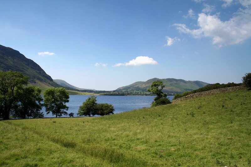 Lake Surrounded by Hills — Green, Serene, Afternoon, Photograph, Trees, Stone Wall