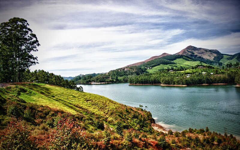 Lake Surrounded by Hills — Green, Serene, Afternoon